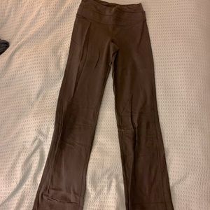Lululemon mid rise black yoga pants size 4